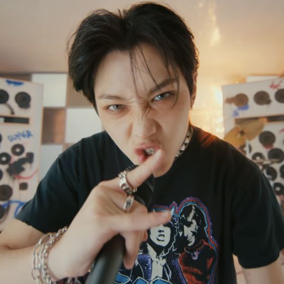 Lee Felix of Stray Kids wearing an ACDC "Highway to Hell" shirt