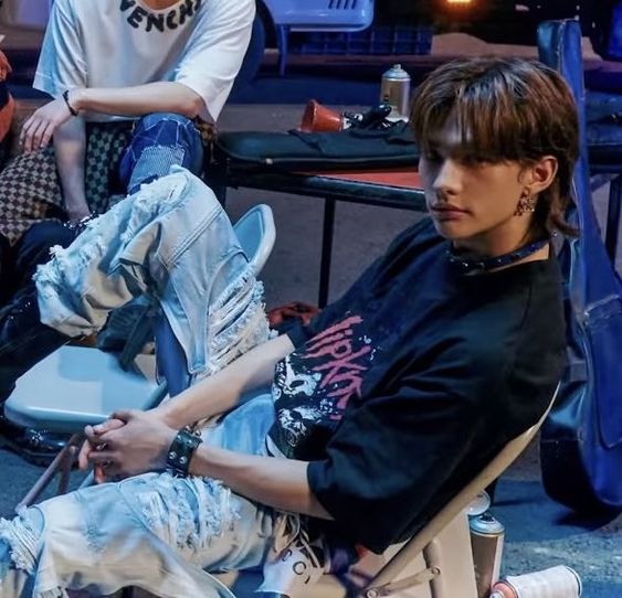 Stray Kids member Hyunjin wearing a Slipknot shirt